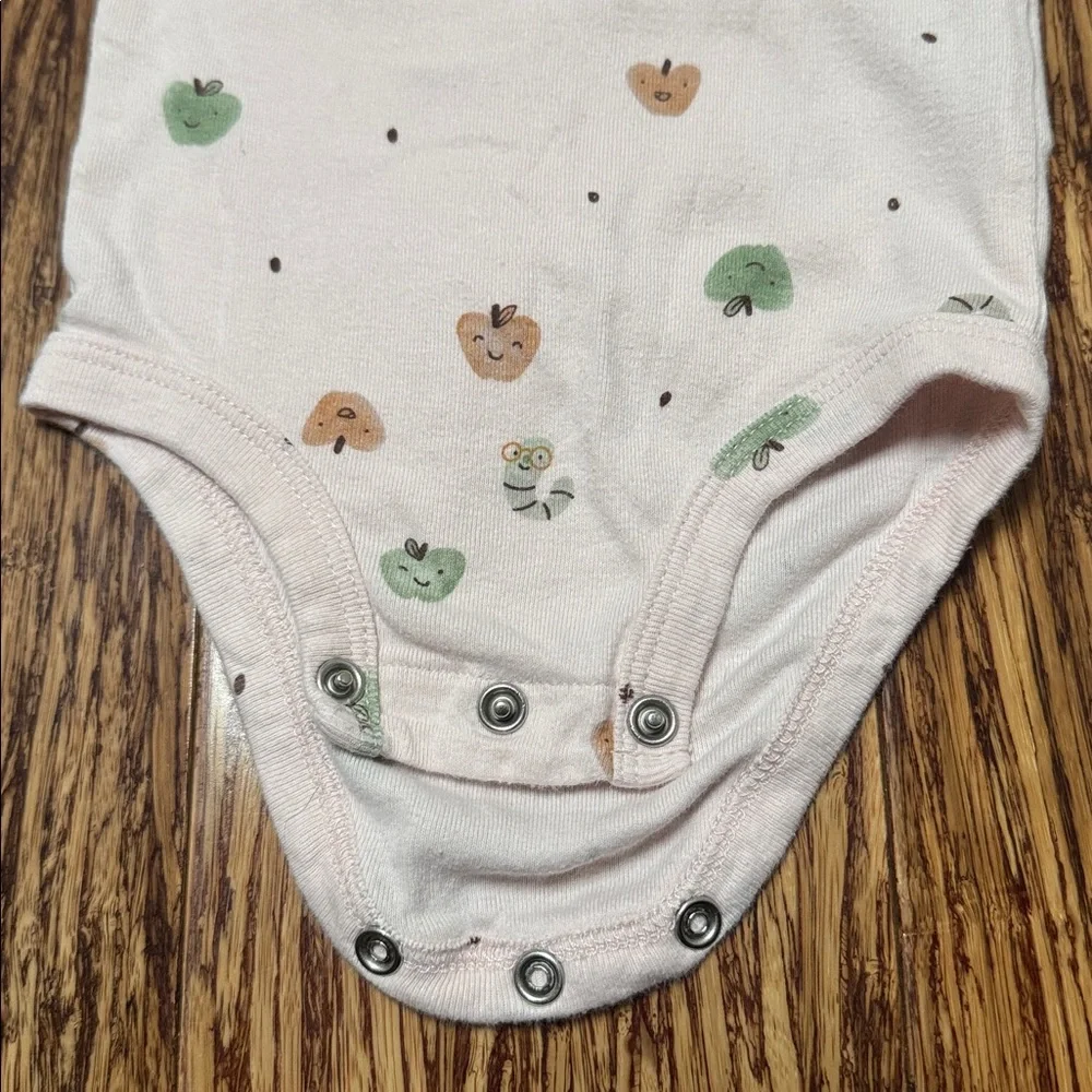 Carter’s blush pink apple worm print baby girl bodysuit size 6M